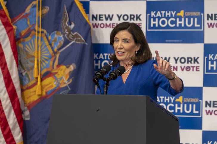 Gov. Kathy Hochul, standing at a podium, speaks during a New York Women "Get Out The Vote" rally at Barnard College. Vice President Kamala Harris and former Secretary Hillary Rodham Clinton joined Hochul and state Attorney General Letitia James as they campaigned at a New York Women GOTV rally with the midterm elections under a week away. Hochul holds a slim lead in the polls against Republican candidate Rep. Lee Zeldin.